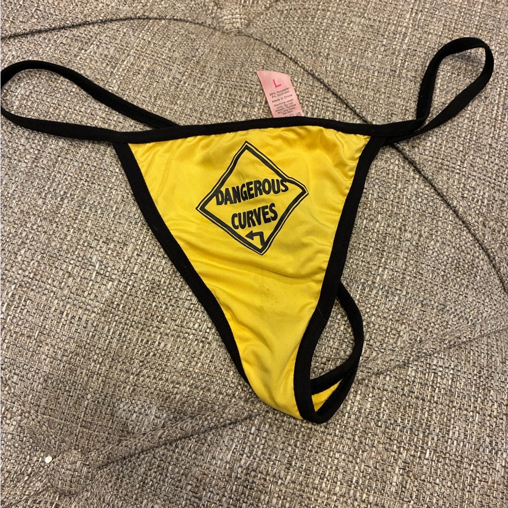 Yellow and Black Thong with 'Dangerous Curves' Design